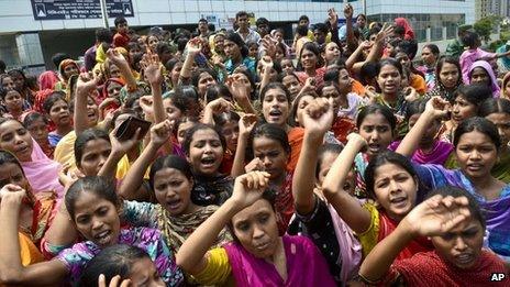 Garment workers shouts slogans during a protest for better working conditions more than a week after the collapse of Rana Plaza on 5 May