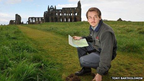 Josh Turner, English Heritage steward, at the site of Whitby Abbey