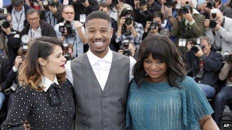 Melonie Diaz, Michael Jordan and Octavia Spencer pose for photographers in Cannes, France, 16 May 2013