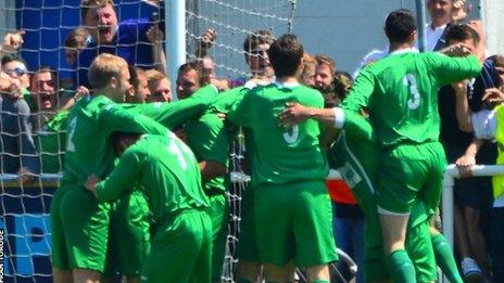 Guernsey celebrate Craig Young's opening goal