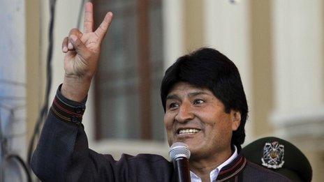 Evo Morales doing the victory sign