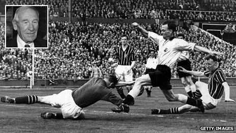 Manchester City's Bert Trautmann dives at the feet of Birmingham's Murphy during the 1956 FA Cup Final. It was while making this save that he broke his neck and, inset, Trautmann in 2008