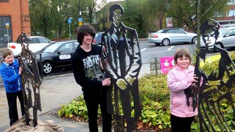 Children with models of Lord Nelson, Stephen Fry and Edith Cavell