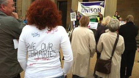 Union members and protestors outside the council