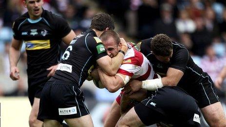 London Broncos tackle Wigan's Lee Mossop