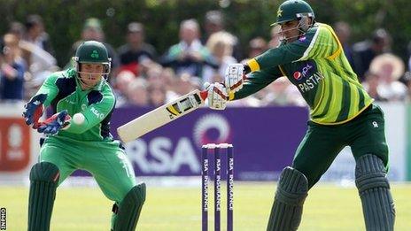 Irish wicket-keeper Gary Wilson prepares to catch the ball as Misbah-ul-Haq attempts a stroke in Sunday's game