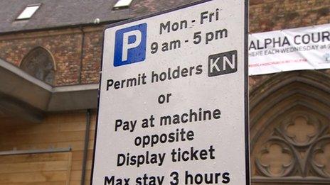 A permit parking sign