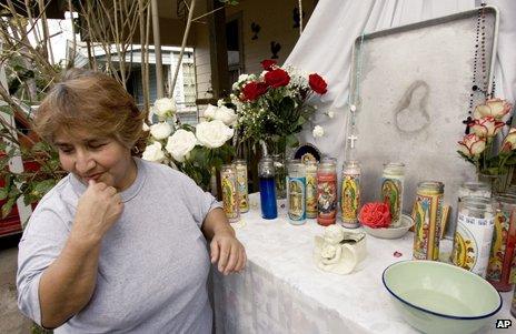 Makeshift shrine to a likeness of Virgin Mary on a baking tray in Houston, Texas, 2007