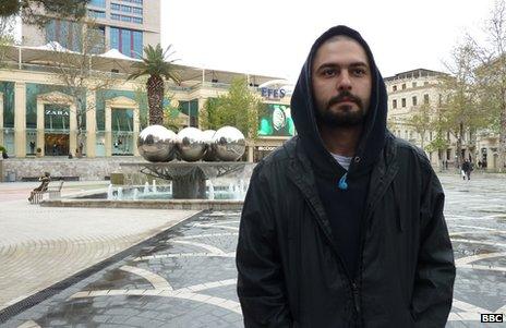 Araz, who says he was beaten up by police at a protest in Baku