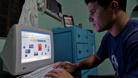 A Cuban man browses an internet website at his house (28/05/2013)