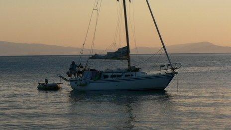 Yacht moored at sunset