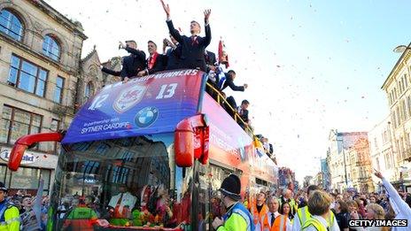 Cardiff City celebrate winning Championship and promotion to Premier League