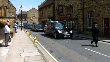 The funeral procession on Half Moon Street in Sherborne