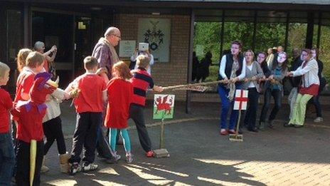 Friends of John Beddoes School staged a tug-of-war protest outside County Hall in Llandrindod Wells