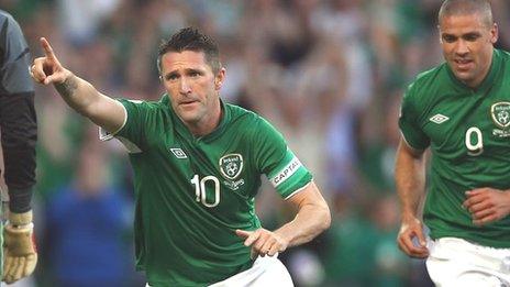 Robbie Keane celebrates his second goal