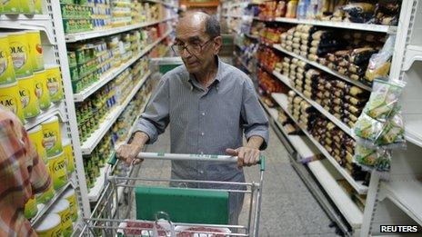 A man in a supermarket in Caracas on 16 May 2013