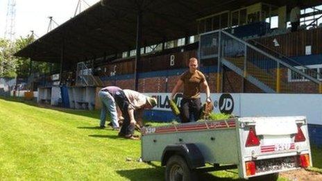 Worcester City fans taking away the pitch at St George's Lane