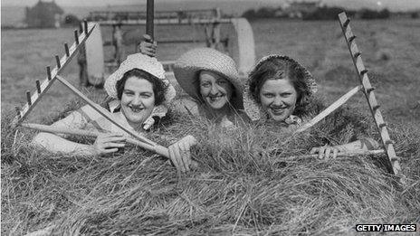 Farm girls in a haystack