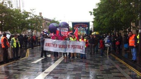 Protest marchers set off from Custom House Square in Belfast