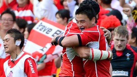 Japan and their fans celebrate