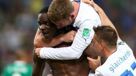 Italy celebrate Mario Balotelli's winner