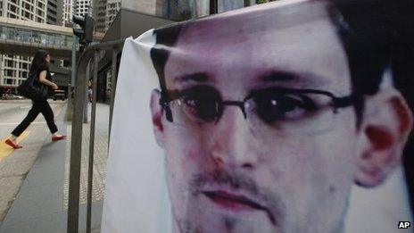 A banner supporting Edward Snowden is displayed at Central, Hong Kong's business district, 20 June 2013