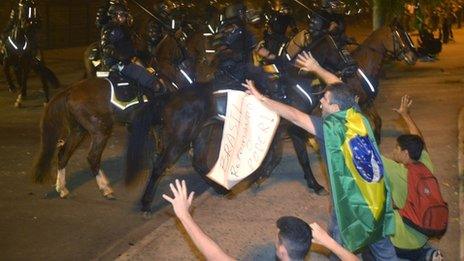 Protesters clash with mounted riot police in Rio de Janeiro. Photo: 20 June 2013