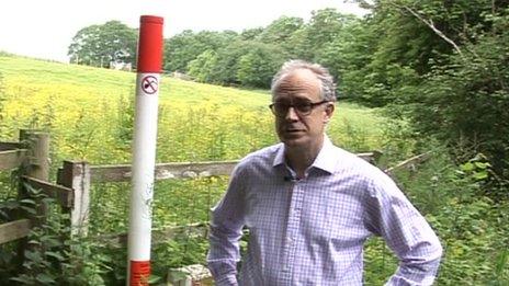 Charles Clover with one of the poles