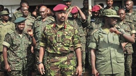 Brigadier Muhoozi Kainerugaba (C) with other officers on 16 August 2012