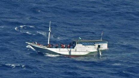 Photo released by the Indonesian National Search And Rescue Agency of a wooden boat believed to have up to 180 asylum seekers on board, off Christmas Island, Australia, 4 July, 2012