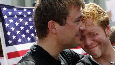 A gay couple celebrate the Supreme Court rulings on gay marriage in Washington DC 26 June 2013