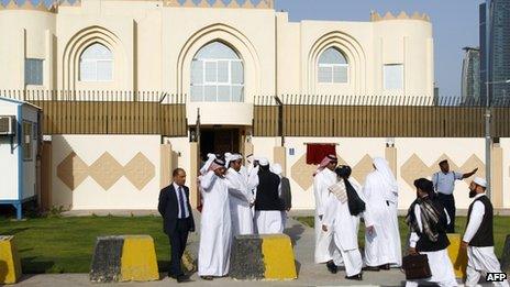 Guests arrive for the opening ceremony of the new Taliban political office in Doha on 18 June 2013