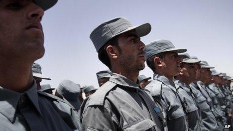 Afghan soldiers attend a transfer of authority ceremony from Nato-led troops to Afghan security forces in Kabul (22 June 2013)