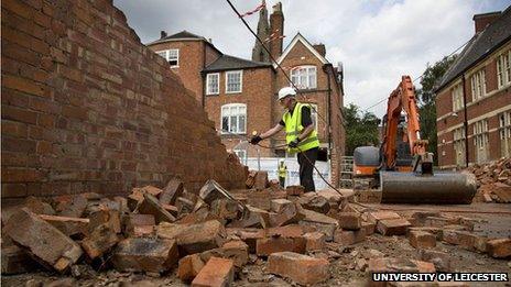 A wall being demolished