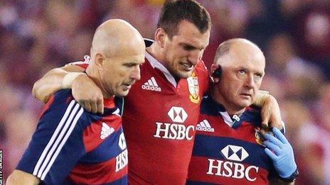 Sam Warburton is helped from the field