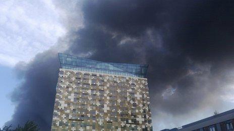 Smoke is seen drifting over Birmingham city centre