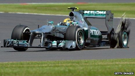 Lewis Hamilton's car suffers a blown tyre