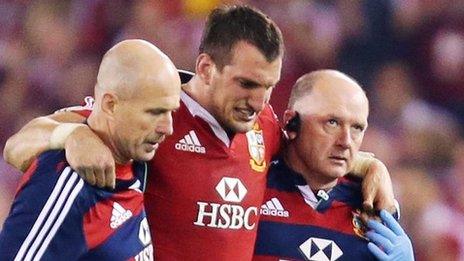 Sam Warburton is helped from the field