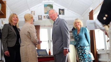 Prince Charles and the Duchess of Cornwall inside the Boathouse