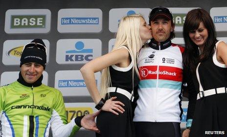 Peter Sagan pinches a podium girl's bottom at the Tour of Flanders