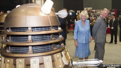 Prince Charles and the Duchess of Cornwall meet a Dalek