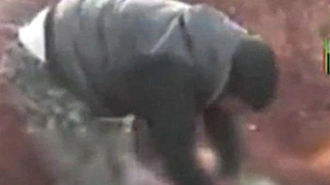 Video still of Abu Sakkar