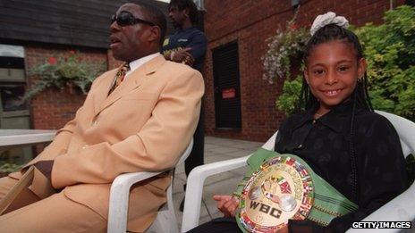 Rachel Bruno displays the WBC World Heavyweight belt that Frank Bruno won in 1995