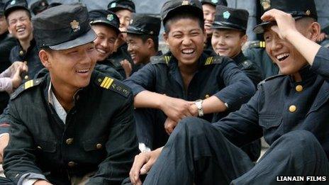 Young soldiers acting as extras on the set of North Korean director Pyo Hang's military film