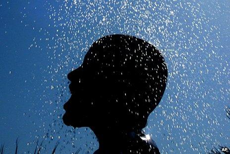 Man in shower in Cyprus