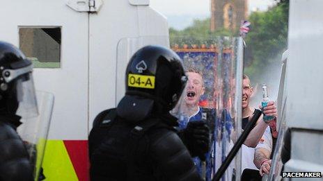 Man confronts police officers