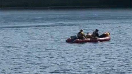 A search team on the Cantref Reservoir on Sunday