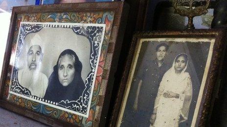 Frames with photos of Faizul Hasan Quadri and his wife Tajammuli Begum just before her death and (right) as a young couple