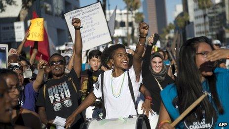 Demonstrators march in Beverly Hills to protest against the acquittal of George Zimmerman for the killing of Trayvon Martin, 17 July 2013