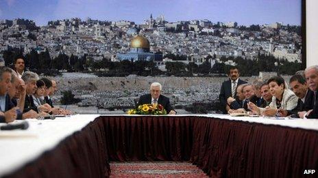 Palestinian president Mahmud Abbas smiles during a meeting with the Palestinian central committee in the West Bank city of Ramallah on July 18, 2013